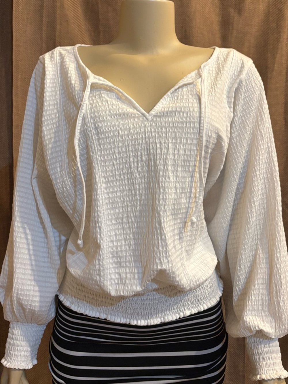 Anthropologie White Textured Peasant Top with Smocked Hem